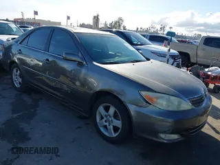 2003 Toyota Camry LE with VIN 4T1BE32K43U760354, listed as a IAAI auction lot 41547088 with 257,688 mi miles and . Bid and sale history available at DreamBid. Image 1.