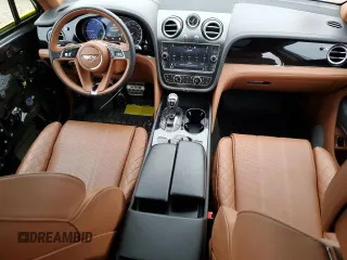 2019 Bentley Bentayga V8 z VIN SJAAM2ZV3KC027120, wystawiony jako Copart lot #83595274 z przebiegiem 28 972 mil mil oraz Szkoda całkowita • Salvage title. Historia ofert i sprzedaży dostępna na DreamBid. Obrazek 8.