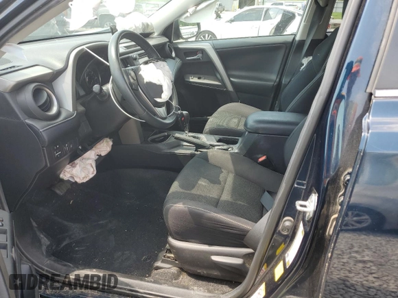 2018 Toyota RAV4 XLE with VIN 2T3WFREVXJW483012, listed as a Copart auction lot 58806205 with 48,266 mi miles and Salvage title. Bid and sale history available at DreamBid. Image 7.