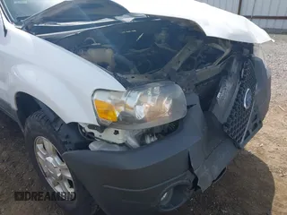 2006 Ford Escape XLT with VIN 1FMCU93106KA36063, listed as a IAAI auction lot 42610043 with 193,703 mi miles and . Bid and sale history available at DreamBid. Image 6.