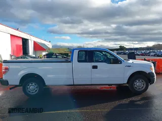 2014 Ford F-150 XL with VIN 1FTFX1CF4EKG53325, listed as a IAAI auction lot 41060015 with 216,554 mi miles. Bid and sale history available at carsss.com. Image 13.