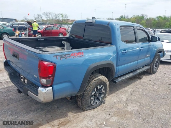 2019 Toyota Tacoma 4WD SR with VIN 3TMCZ5AN0KM260201, listed as a IAAI auction lot 42017048 with 49,216 mi miles. Bid and sale history available at carsss.com. Image 4.