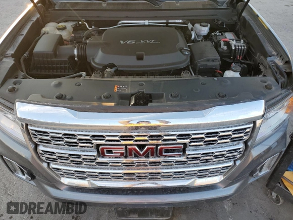 2021 GMC Canyon 4WD Denali with VIN 1GTG6EEN4M1130779, listed as a Copart auction lot 82695044 with 38,662 mi miles and Salvage Title. Bid and sale history available at carsss.com. Image 11.