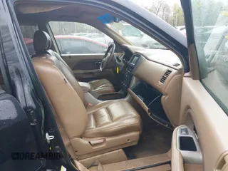 2006 Honda Pilot EX-L with VIN 5FNYF18776B021690, listed as a IAAI auction lot 42016219 with 239,666 mi miles and . Bid and sale history available at DreamBid. Image 5.