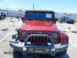 2008 Jeep Wrangler Unlimited Sahara with VIN 1J4GA59108L594193, listed as a IAAI auction lot 42272239 with 161,912 mi miles and . Bid and sale history available at DreamBid. Image 12.