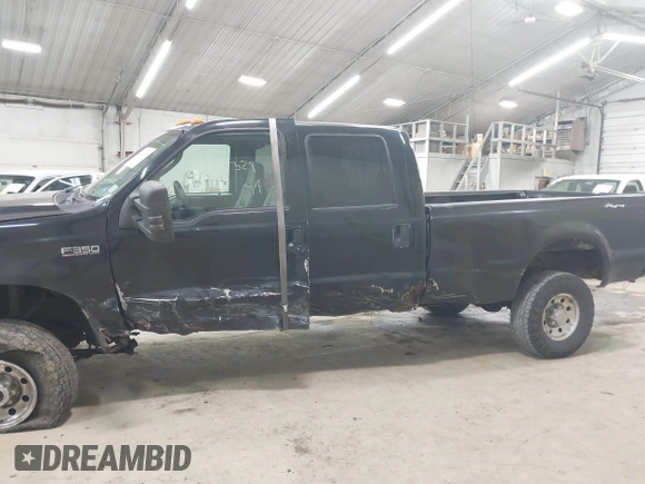 2004 Ford F-350 XL z VIN 1FTSW31P74EB44030, wystawiony jako IAAI lot #42232329 z przebiegiem 141 796 mil mil oraz . Historia ofert i sprzedaży dostępna na DreamBid. Obrazek 14.