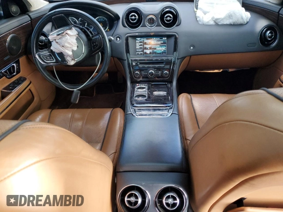 2015 Jaguar XJ Portfolio with VIN SAJWJ2GD2F8V76289, listed as a Copart auction lot 48222815 with 95,420 mi miles and Salvage title. Bid and sale history available at DreamBid. Image 8.