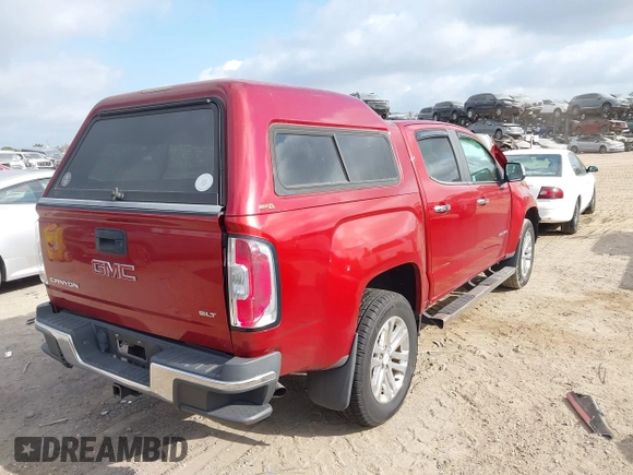 2016 GMC Canyon 2WD SLT with VIN 1GTG5DE32G1242691, listed as a IAAI auction lot 41548996 with 52,422 mi miles. Bid and sale history available at carsss.com. Image 4.
