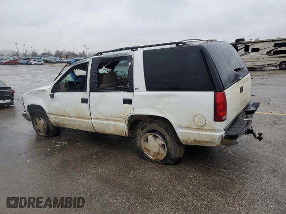 1998 Chevrolet Tahoe z VIN 1GNEK13R4WJ346191, wystawiony jako Copart lot #86583514 z przebiegiem 2 650 816 mil mil oraz Szkoda całkowita • Salvage title. Historia ofert i sprzedaży dostępna na DreamBid. Obrazek 2.