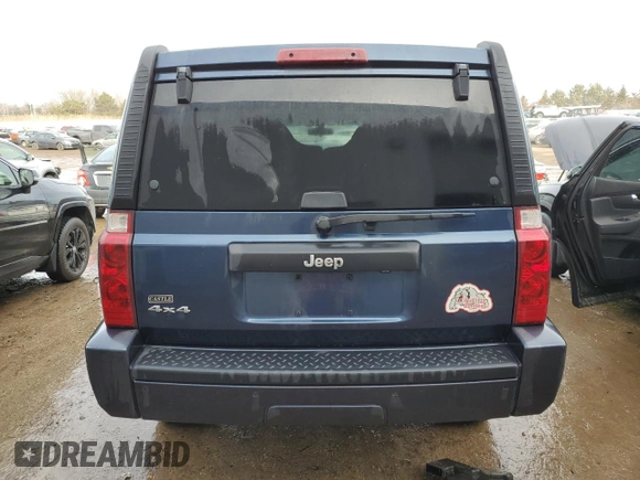 2010 Jeep Commander Sport with VIN 1J4RG4GK5AC119433, listed as a Copart auction lot 87657265 with 212,973 mi miles and Salvage title. Bid and sale history available at DreamBid. Image 6.