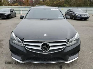2014 Mercedes-Benz E 400 Sport with VIN WDDHF9FB4EA909283, listed as a Copart auction lot 73703584 with 73,857 mi miles and Salvage Title. Bid and sale history available at DreamBid. Image 5.