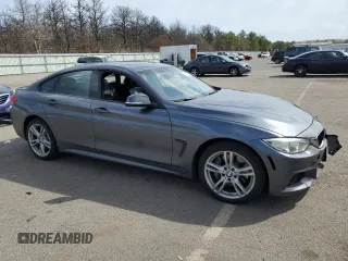 2016 BMW 4 Series 428i xDrive with VIN WBA4C9C50GG137720, listed as a Copart auction lot 50240545 with 60,705 mi miles and Salvage Title. Bid and sale history available at DreamBid. Image 4.