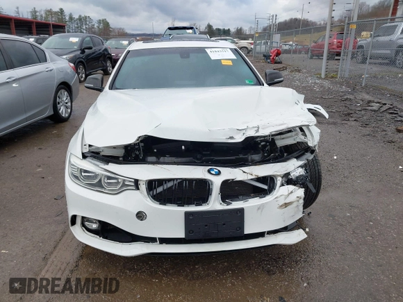 2014 BMW 4 Series 428i with VIN WBA3N3C58EF712202, listed as a IAAI auction lot 41843517 with 90,958 mi miles and . Bid and sale history available at DreamBid. Image 13.