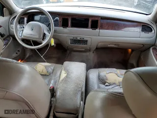 2001 Lincoln Town Car Executive with VIN 1LNHM81W81Y700002, listed as a Copart auction lot 47018365 with 129,456 mi miles and Salvage Title. Bid and sale history available at carsss.com. Image 8.
