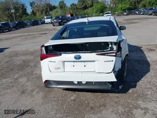 2022 Toyota Prius L Eco with VIN JTDKAMFUXN3163123, listed as a IAAI auction lot 41666679 with 68,026 mi miles. Bid and sale history available at carsss.com. Image 16.