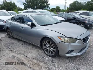 2014 Mazda 6 i Grand Touring с VIN JM1GJ1W6XE1159641, выставлен на аукционе IAAI как лот 39305628 с пробегом 107 853 миль миль и . История ставок и продаж доступна на DreamBid. Изображение 1.