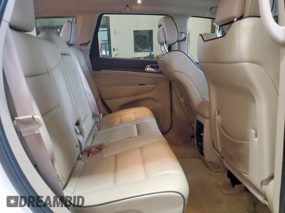 2017 Jeep Grand Cherokee Overland with VIN 1C4RJECG9HC916342, listed as a Copart auction lot 60658285 with 59,470 mi miles and Salvage title. Bid and sale history available at DreamBid. Image 10.