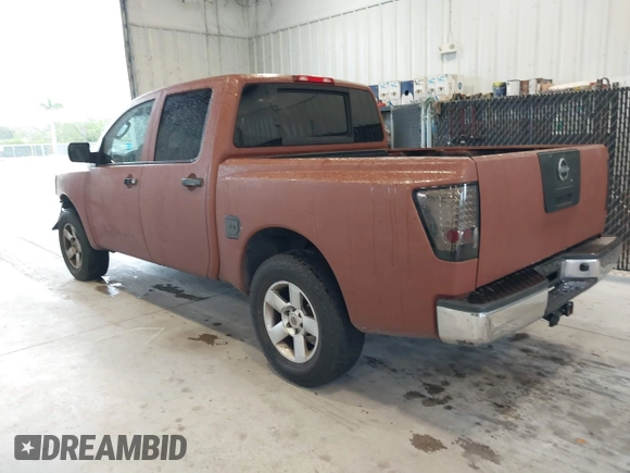 2007 Nissan Titan XE with VIN 1N6BA07A57N233449, listed as a IAAI auction lot 41381833 with 176,720 mi miles. Bid and sale history available at carsss.com. Image 3.
