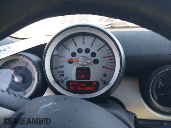 2009 MINI Convertible with VIN WMWMR33569TU95961, listed as a IAAI auction lot 41689845 with 107,934 mi miles and . Bid and sale history available at DreamBid. Image 7.