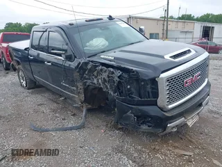 2017 GMC Sierra 2500HD Denali with VIN 1GT12UEY1HF108821, listed as a IAAI auction lot 42445998 with 97,342 mi miles and . Bid and sale history available at DreamBid. Image 1.