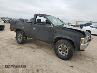 1995 Nissan Frontier XE with VIN 1N6SD11Y2SC308065, listed as a Copart auction lot 45282595 with 51,994 mi miles and Salvage title. Bid and sale history available at DreamBid. Image 4.