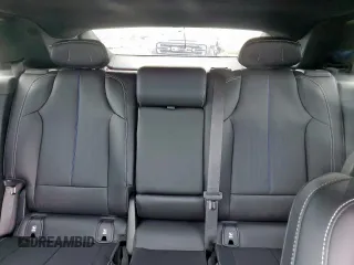 2023 Cadillac LYRIQ RWD Luxury z VIN 1GYKPMRK7PZ000805, wystawiony jako Copart lot #59610415 z przebiegiem 17 099 mil mil oraz Szkoda całkowita • Salvage title. Historia ofert i sprzedaży dostępna na DreamBid. Obrazek 10.