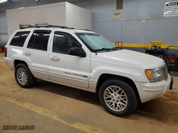 2004 Jeep Grand Cherokee Limited with VIN 1J4GW58N34C387393, listed as a Copart auction lot 41846405 with 160,606 mi miles and Salvage Title. Bid and sale history available at carsss.com. Image 4.