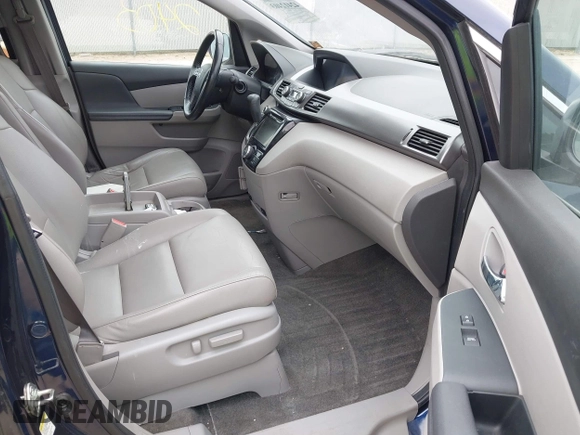 2015 Honda Odyssey EX-L z VIN 5FNRL5H68FB070392, wystawiony jako IAAI lot #42412403 z przebiegiem 146 907 mil mil oraz . Historia ofert i sprzedaży dostępna na DreamBid. Obrazek 5.