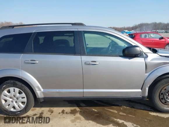 2016 Dodge Journey American Value with VIN 3C4PDCAB3GT234988, listed as a IAAI auction lot 41764190 with 124,077 mi miles and . Bid and sale history available at DreamBid. Image 13.