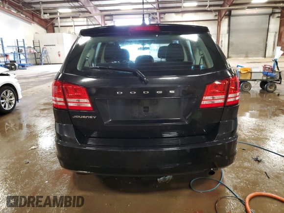 2013 Dodge Journey American Value with VIN 3C4PDCABXDT502334, listed as a Copart auction lot 58428235 with 162,009 mi miles and Clean title. Bid and sale history available at DreamBid. Image 6.