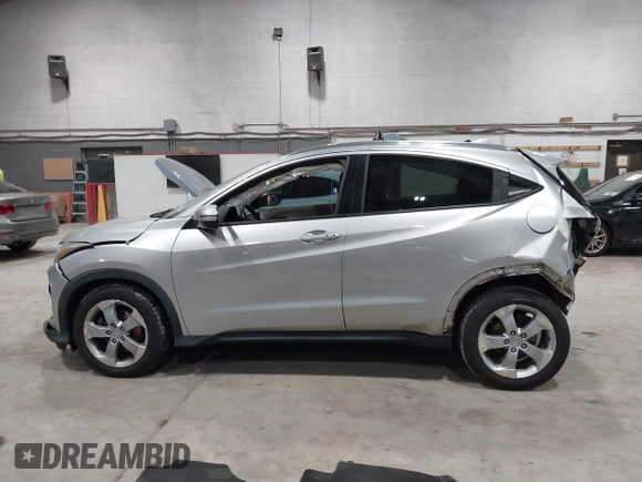 2016 Honda HR-V EX-L w/Navi with VIN 3CZRU6H7XGM711089, listed as a IAAI auction lot 41801419 with 68,983 mi miles. Bid and sale history available at carsss.com. Image 14.
