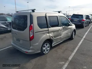 2015 Ford Transit Connect Wagon XLT with VIN NM0AE8F74F1179538, listed as a IAAI auction lot 41505221 with 57,798 mi miles. Bid and sale history available at carsss.com. Image 4.