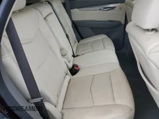 2018 Cadillac XT5 Premium Luxury FWD z VIN 1GYKNERS5JZ127703, wystawiony jako Copart lot #58315215 z przebiegiem Nie podano mil oraz Szkoda całkowita • Salvage title. Historia ofert i sprzedaży dostępna na DreamBid. Obrazek 10.