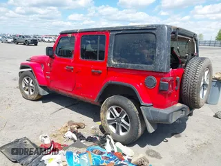 2018 Jeep Wrangler Unlimited Sahara with VIN 1C4HJXEG6JW174359, listed as a IAAI auction lot 42009968 with 79,830 mi miles and . Bid and sale history available at DreamBid. Image 3.