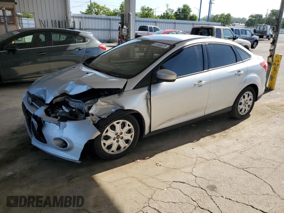 2012 Ford Focus SE with VIN 1FAHP3F29CL161559, listed as a Copart auction lot 61695575 with 127,412 mi miles and Salvage title. Bid and sale history available at DreamBid. Image 1.