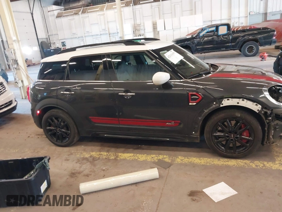 2020 MINI Countryman John Cooper Works z VIN WMZYZ9C07L3L84189, wystawiony jako IAAI lot #42163459 z przebiegiem 49 416 mil mil oraz . Historia ofert i sprzedaży dostępna na DreamBid. Obrazek 14.