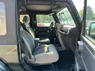 2010 Jeep Wrangler Sahara with VIN 1J4AA5D18AL222491, listed as a Copart auction lot 60045815 with 173,280 mi miles and Clean title. Bid and sale history available at DreamBid. Image 7.