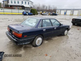 1989 Toyota Camry z VIN JT2SV21E6K3335385, wystawiony jako Copart lot #82466934 z przebiegiem 74 815 mil mil oraz Czysty tytuł • Clean title. Historia ofert i sprzedaży dostępna na DreamBid. Obrazek 3.