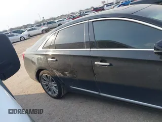 2019 Cadillac XTS Luxury with VIN 2G61M5S38K9100792, listed as a IAAI auction lot 41676187 with 103,056 mi miles and . Bid and sale history available at DreamBid. Image 6.