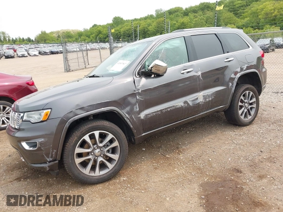 2017 Jeep Grand Cherokee Overland with VIN 1C4RJFCG6HC964435, listed as a IAAI auction lot 42407567 with 113,760 mi miles and . Bid and sale history available at DreamBid. Image 18.