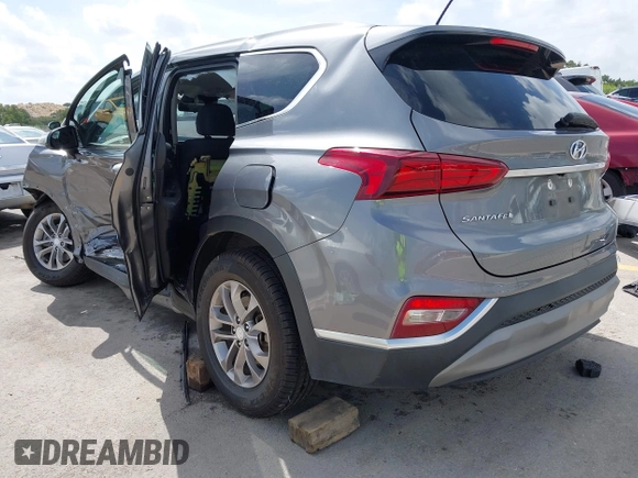 2019 Hyundai Santa Fe SE with VIN 5NMS23AD2KH108936, listed as a IAAI auction lot 42626196 with 72,757 mi miles and . Bid and sale history available at DreamBid. Image 3.