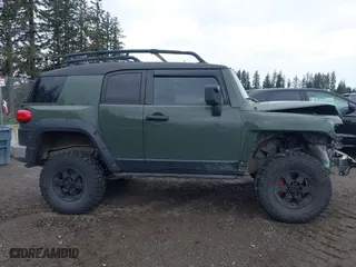 2011 Toyota FJ Cruiser with VIN JTEBU4BF5BK108168, listed as a IAAI auction lot 41829688 with 163,354 mi miles. Bid and sale history available at carsss.com. Image 14.