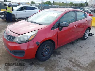 2013 Kia Rio LX with VIN KNADM4A38D6110543, listed as a IAAI auction lot 42068435 with 163,523 mi miles. Bid and sale history available at carsss.com. Image 2.