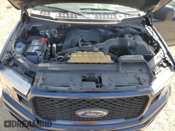 2018 Ford F-150 XL with VIN 1FTEW1EP5JFB40530, listed as a Copart auction lot 52946645 with 106,796 mi miles and Salvage Title. Bid and sale history available at carsss.com. Image 11.