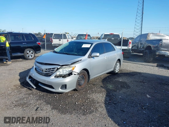 2013 Toyota Corolla L with VIN 5YFBU4EE7DP166021, listed as a IAAI auction lot 42027062 with 179,107 mi miles and . Bid and sale history available at DreamBid. Image 18.
