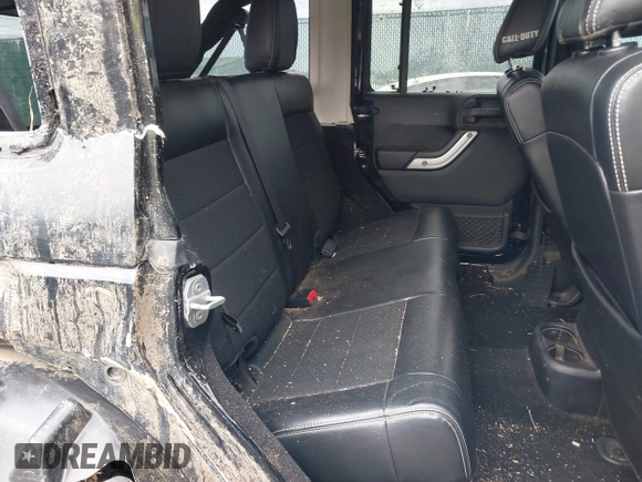 2012 Jeep Wrangler Unlimited Call of Duty MW3 z VIN 1C4BJWFG0CL202238, wystawiony jako IAAI lot #41956648 z przebiegiem 92 572 mil mil oraz . Historia ofert i sprzedaży dostępna na DreamBid. Obrazek 8.