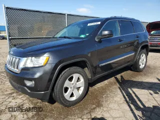 2012 Jeep Grand Cherokee Laredo with VIN 1C4RJFAG4CC203267, listed as a Copart auction lot 54910285 with 143,289 mi miles and Clean Title. Bid and sale history available at carsss.com. Image 1.
