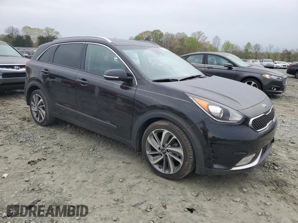 2017 Kia Niro Touring with VIN KNDCE3LC7H5055145, listed as a Copart auction lot 45996494 with 90,695 mi miles and Salvage Title. Bid and sale history available at DreamBid. Image 4.
