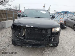 2015 Jeep Grand Cherokee Altitude with VIN 1C4RJFAG1FC210908, listed as a IAAI auction lot 41550173 with 168,905 mi miles. Bid and sale history available at carsss.com. Image 13.