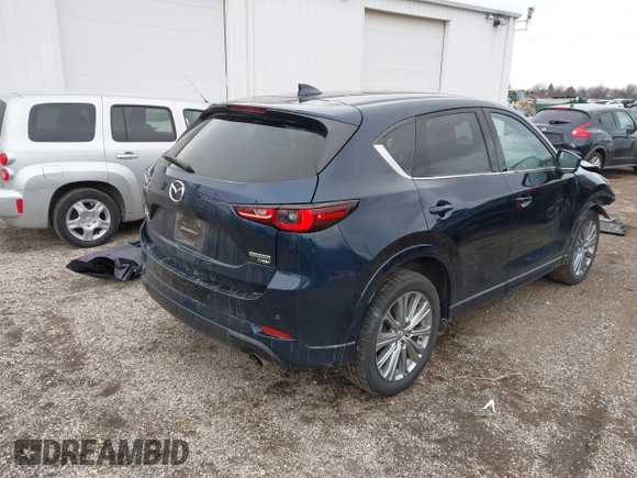 2023 Mazda CX-5 Signature with VIN JM3KFBXY5P0251046, listed as a IAAI auction lot 41505815 with 37,594 mi miles and . Bid and sale history available at carsss.com. Image 4.